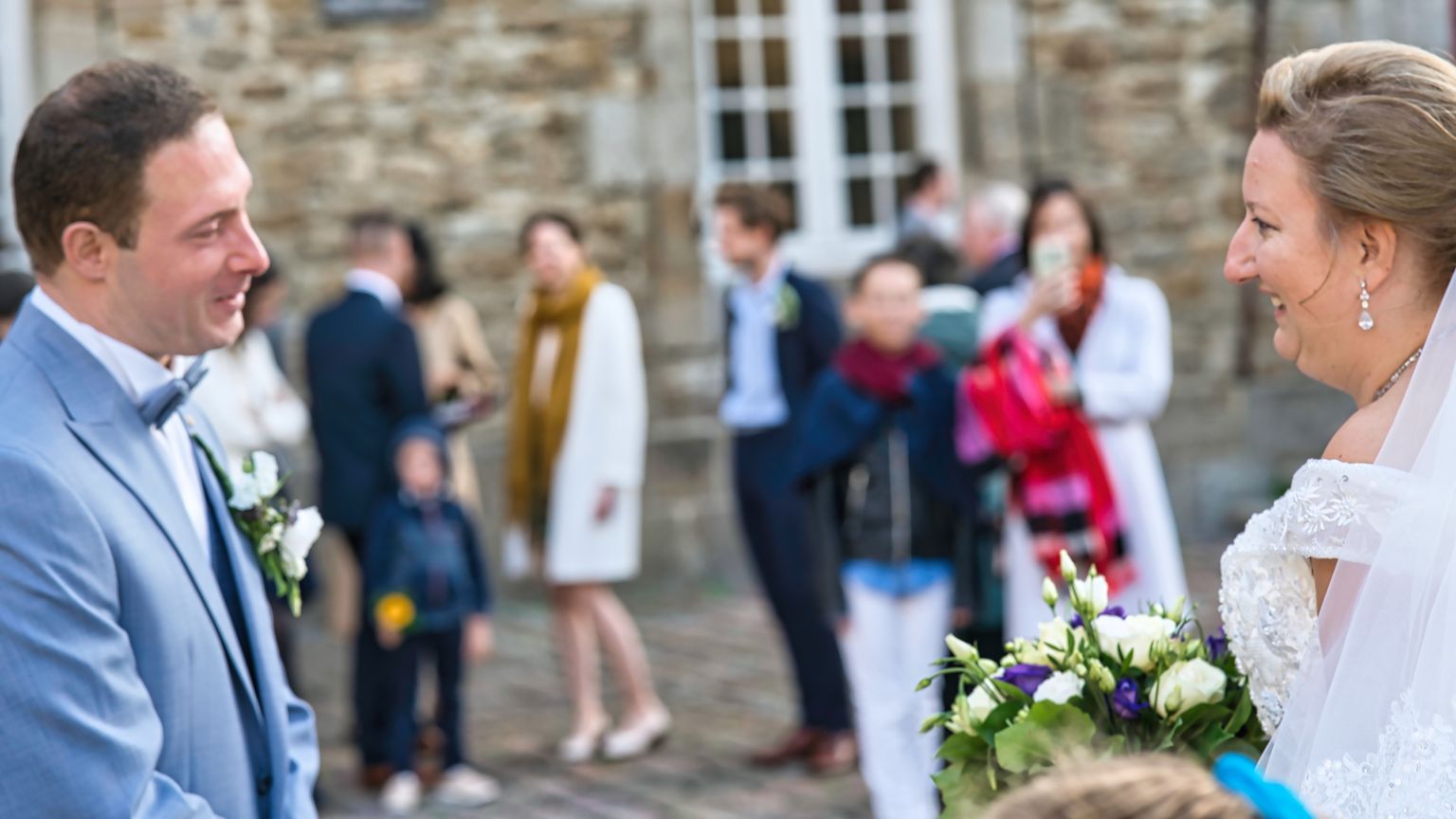 Bride Presenting Flowers to Groom