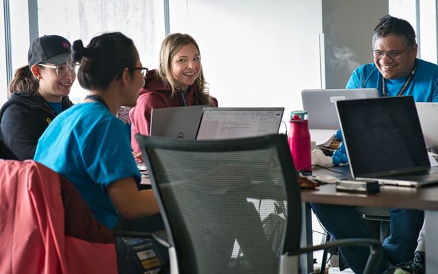 Hackathon Group Laughing